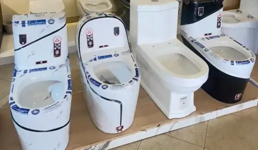 Toilets on display at Brazil Plumbing Center showroom, Fort Portal